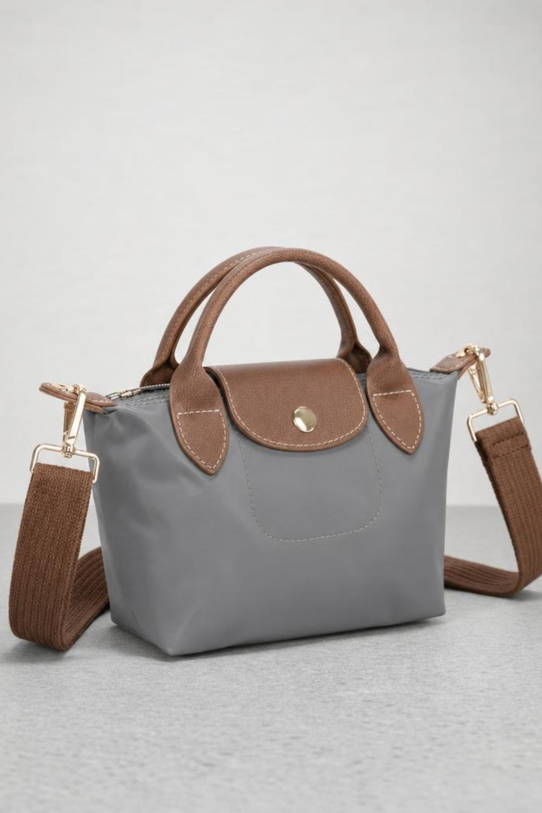 Mini Pouch Crossbody Bag In Grey by SVNX - HB348511