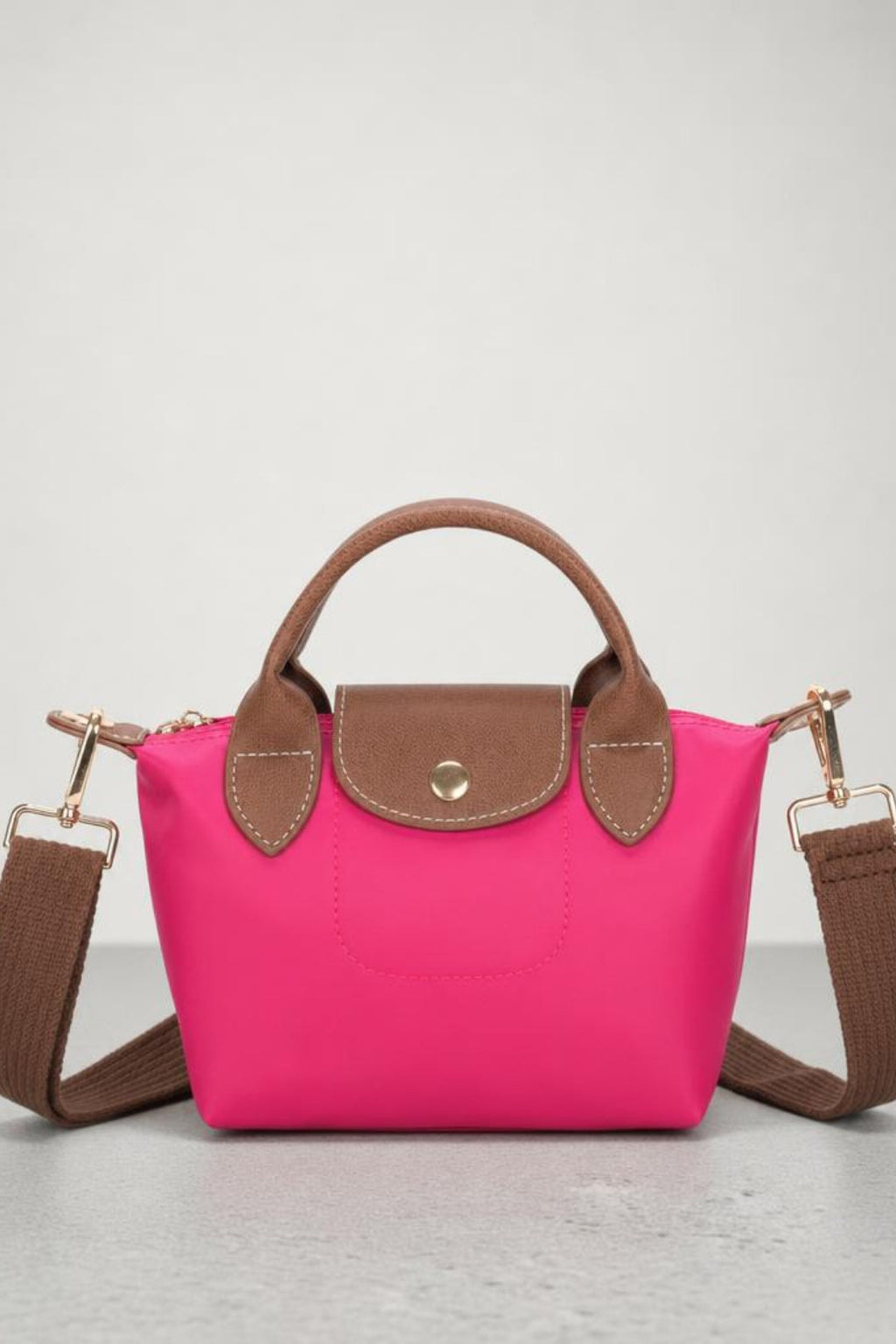 Mini Pouch Crossbody Bag In Hot Pink by SVNX - HB348504