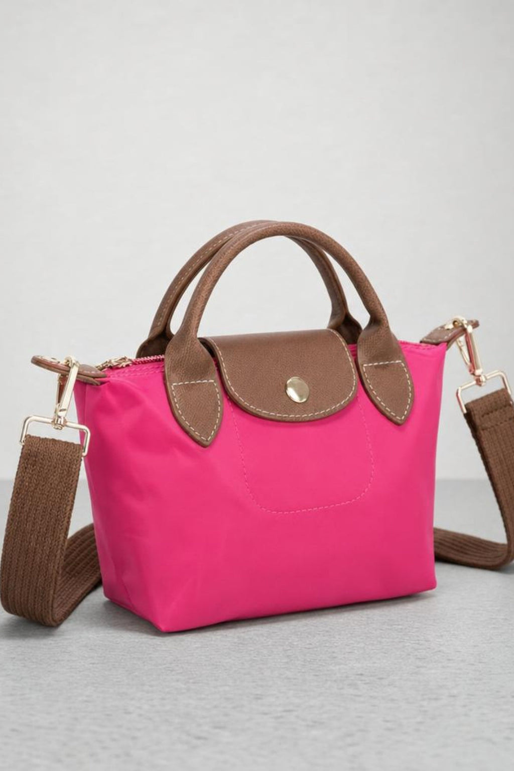 Mini Pouch Crossbody Bag In Hot Pink by SVNX - HB348504