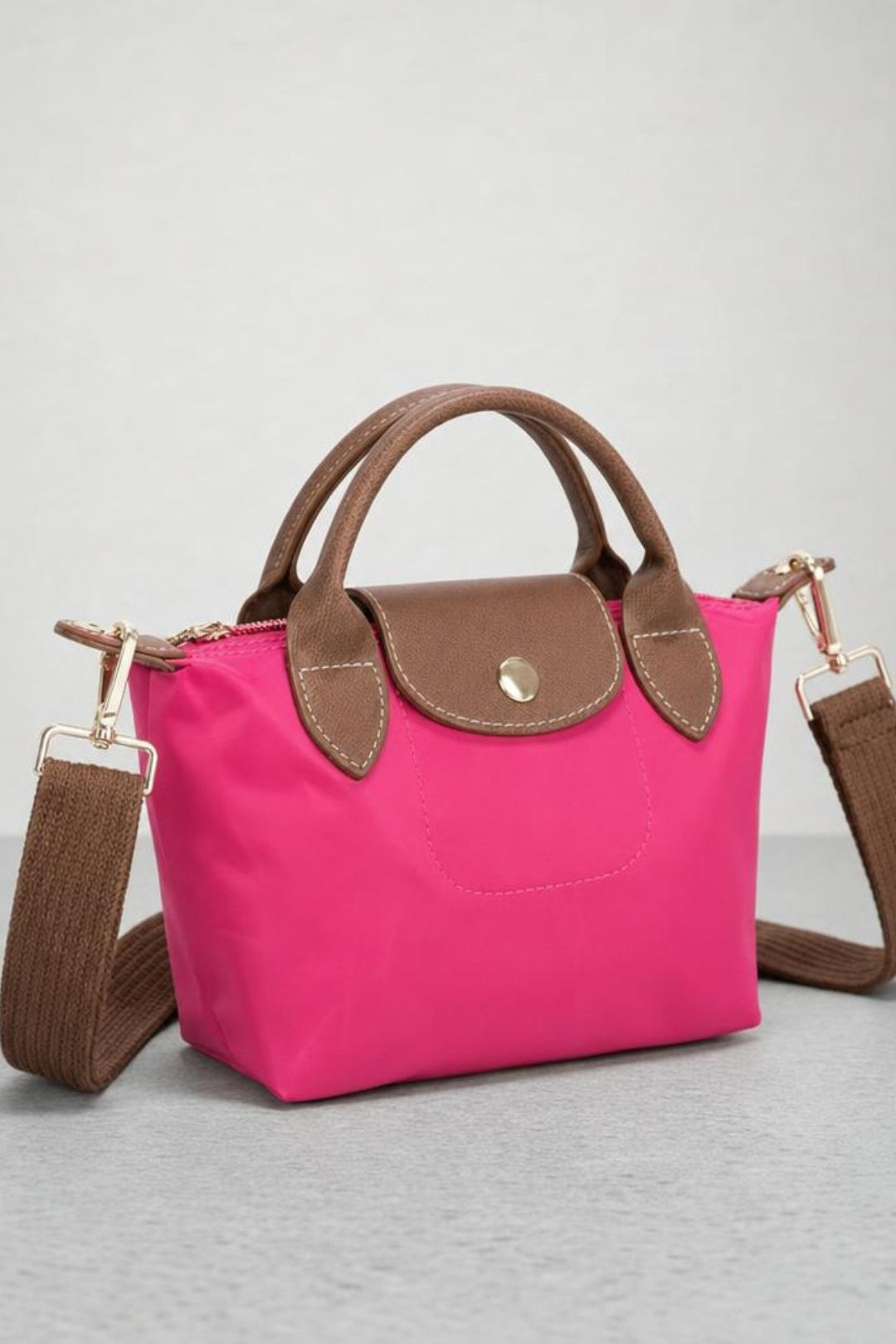 Mini Pouch Crossbody Bag In Hot Pink by SVNX - HB348504