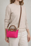 Mini Pouch Crossbody Bag In Hot Pink by SVNX - HB348504