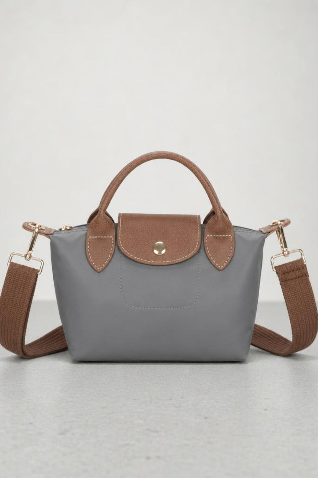 Mini Pouch Crossbody Bag In Grey by SVNX - HB348511