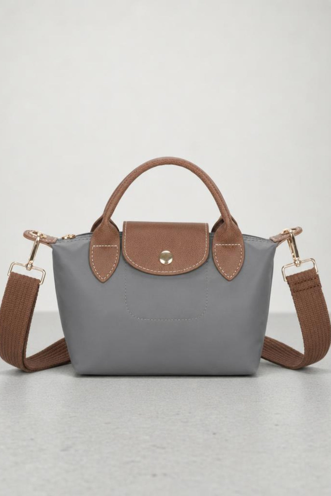 Mini Pouch Crossbody Bag In Grey by SVNX - HB348511