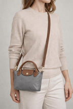 Mini Pouch Crossbody Bag In Grey by SVNX - HB348511